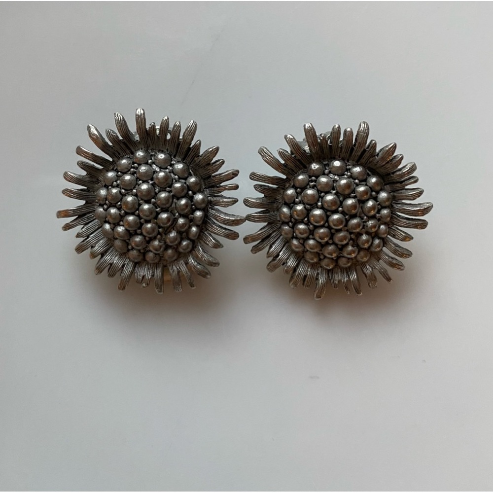 Vintage Oscar de la Renta rare silver tone sunflower earrings.